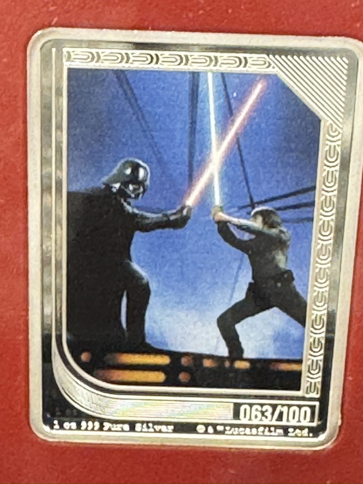 Darth Vader vs. Luke Skywalker collectible in the display case